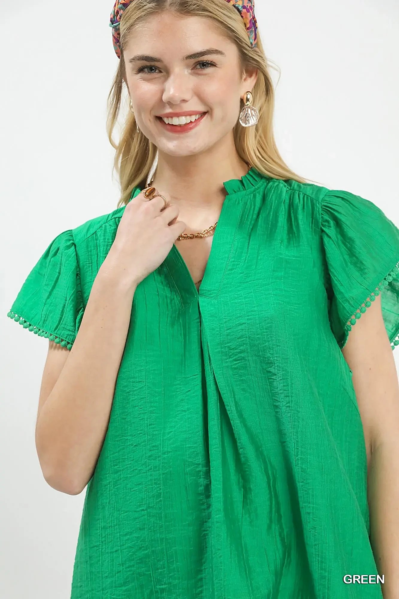 Umgee Flutter Sleeve Relaxed Top with Trim Detail -