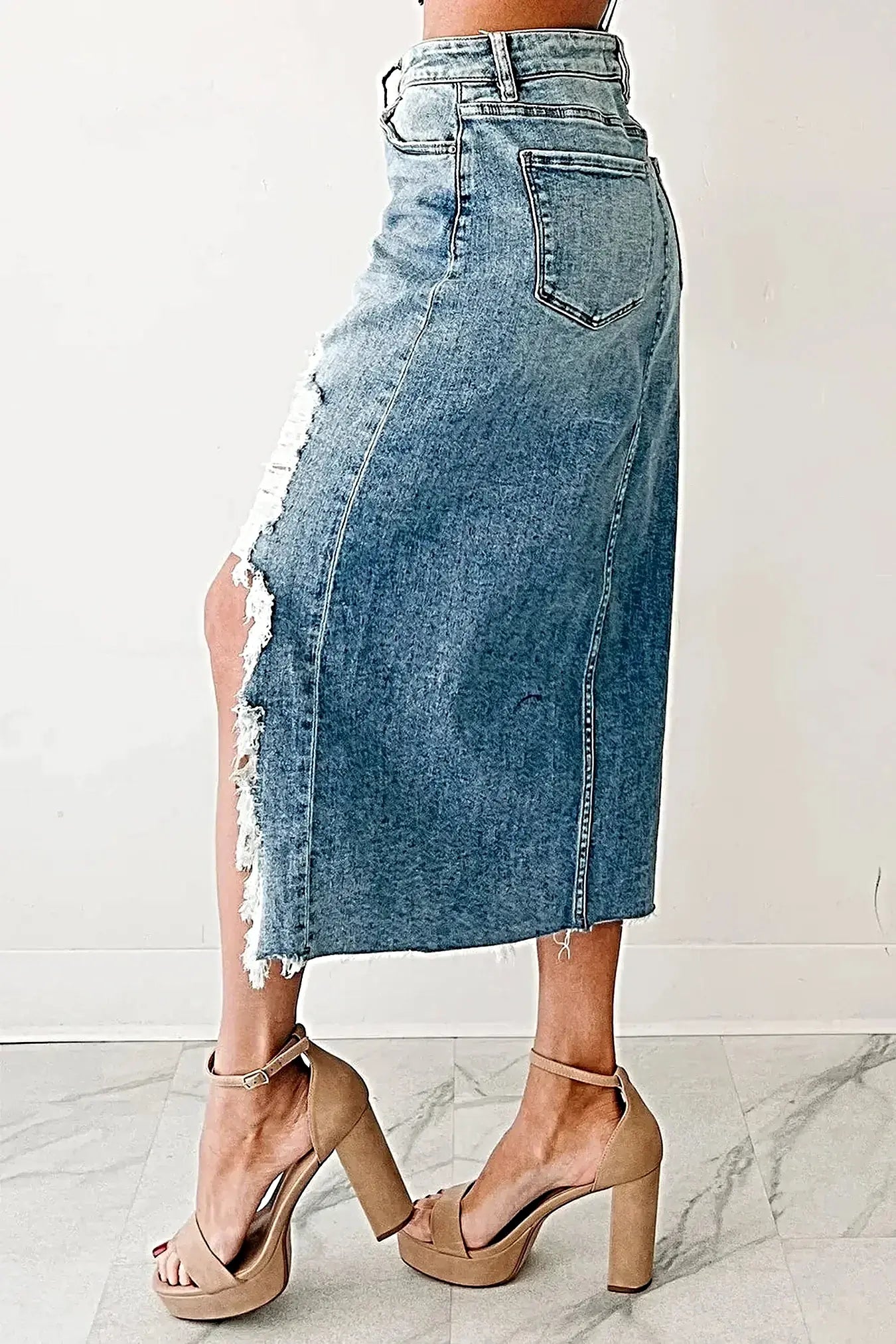 Distressed Asymmetrical Denim Skirt with Frayed Hem -