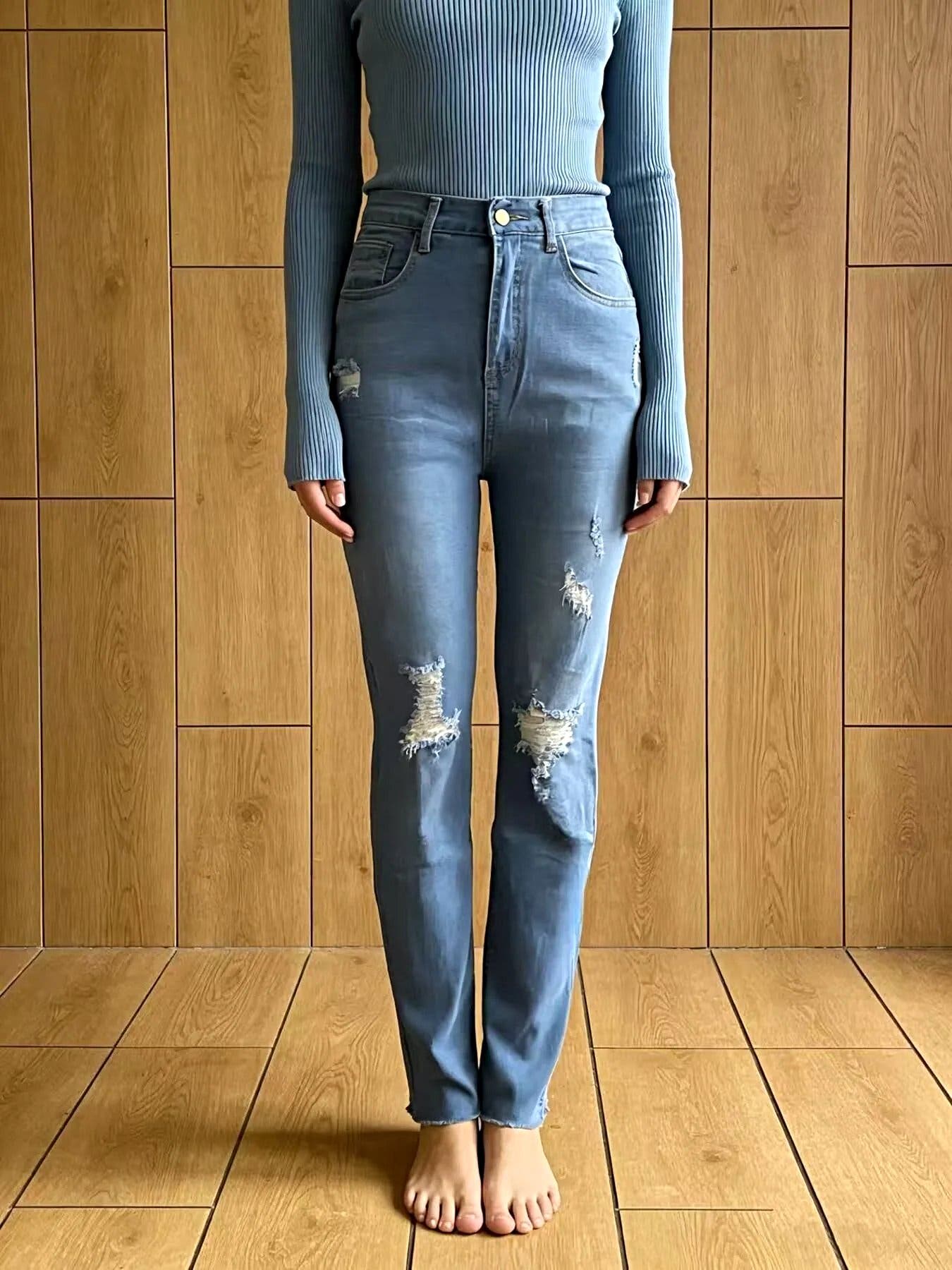 High-Waisted Distressed Jeans -