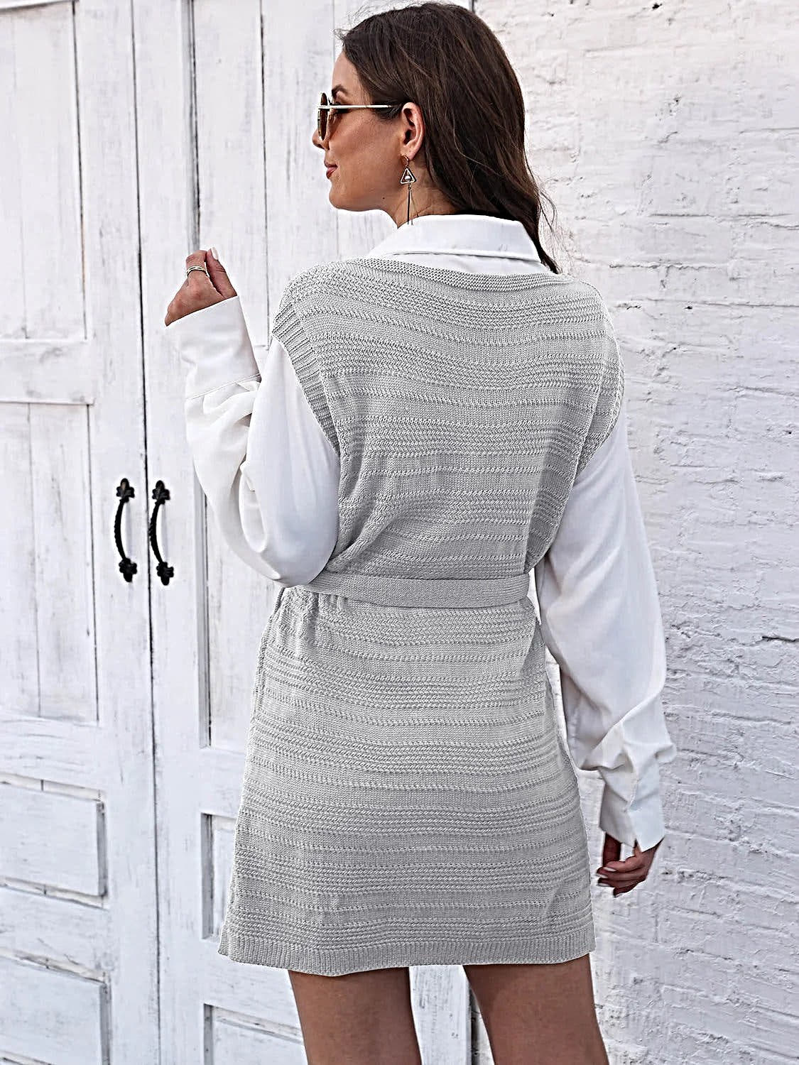Luxury Tie Front Sweater Dress With V-Neck, Sleeveless Design, And Elegant Slit -