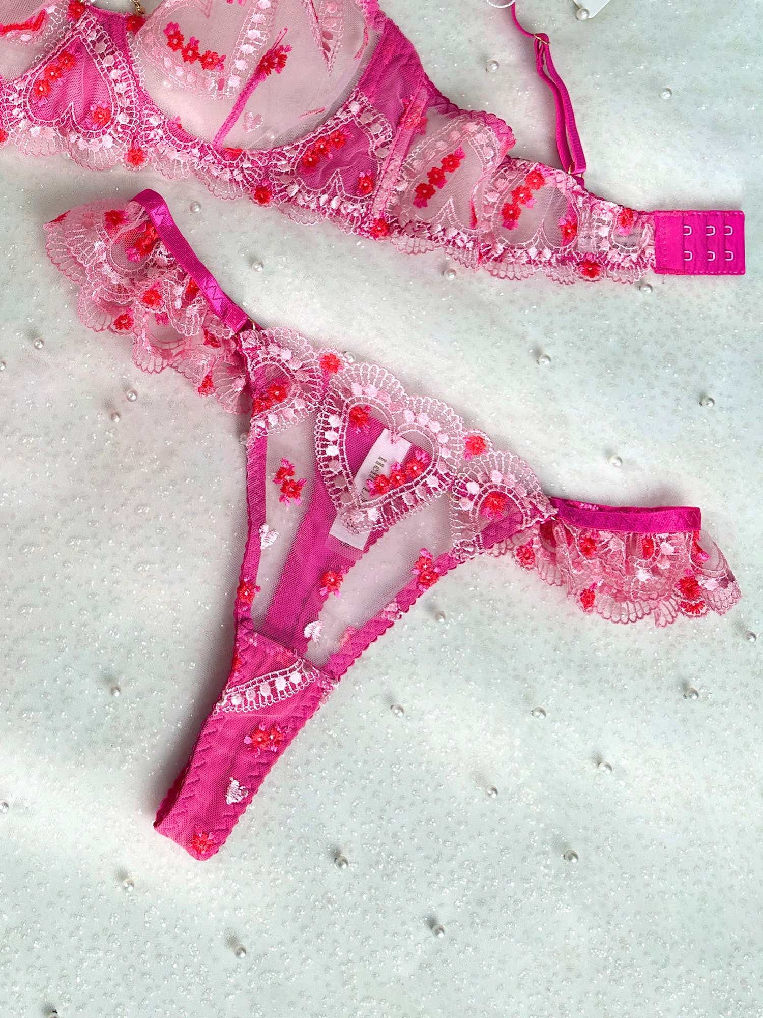 Complete view of the Gabrielle Seductive Lingerie Set presenting its elegant heart embroidery and alluring garter belt design.