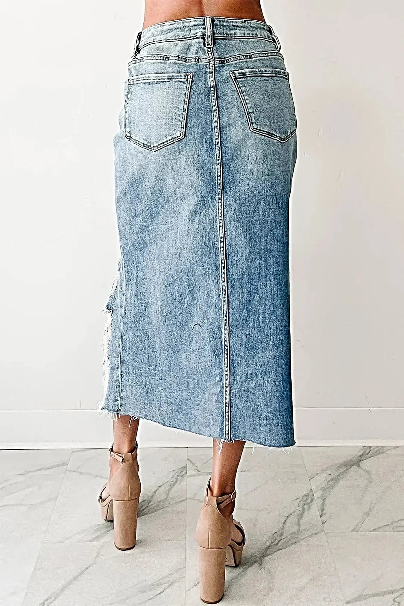 Distressed Asymmetrical Denim Skirt with Frayed Hem -
