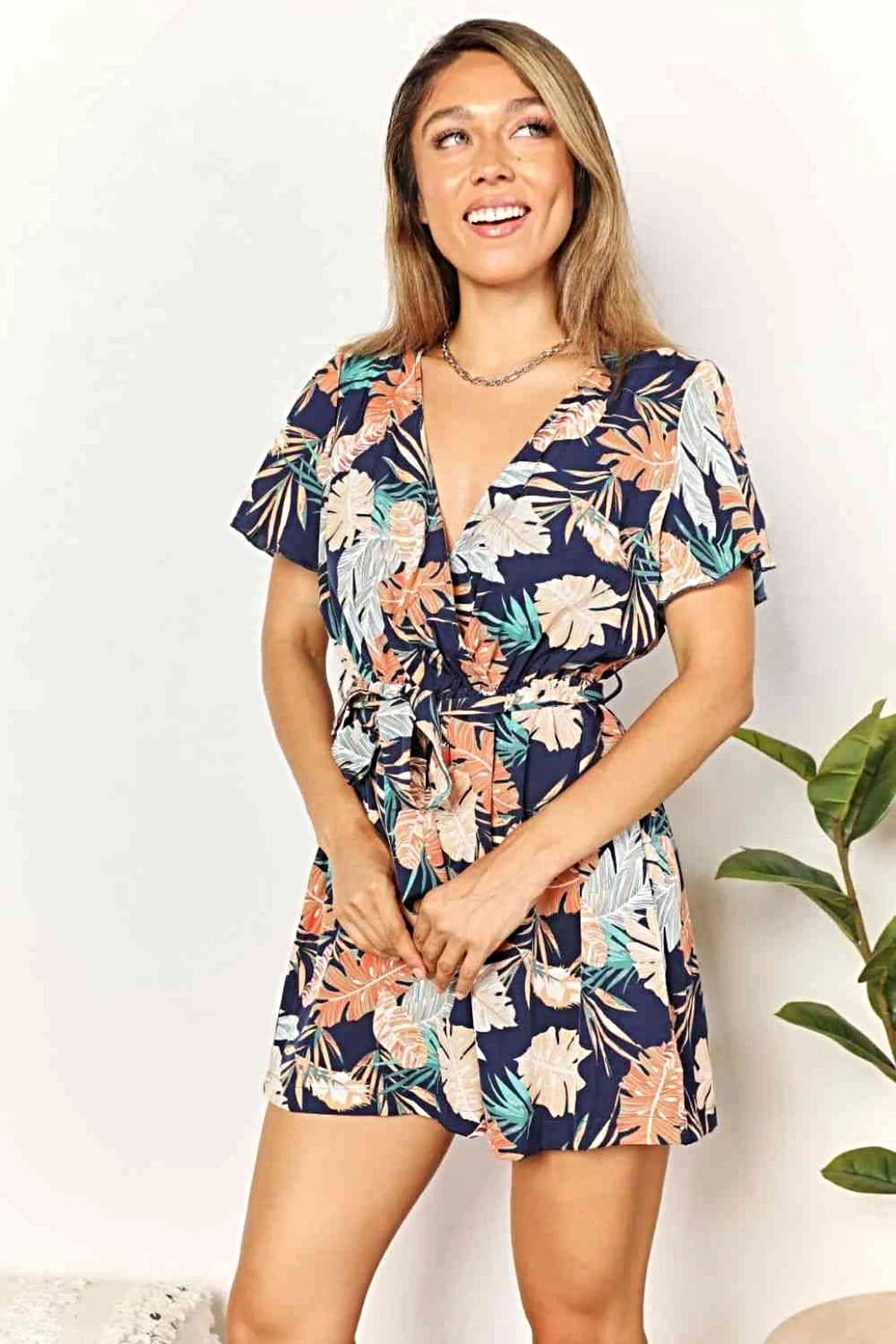 Elegant 1.5% Surplice Neck Botanical Print Romper With Tie Waist & Flutter Sleeves Trendsi