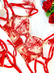 Luxury Red Lace Lingerie Set with a beautiful backdrop, perfect for celebrating femininity and allure.