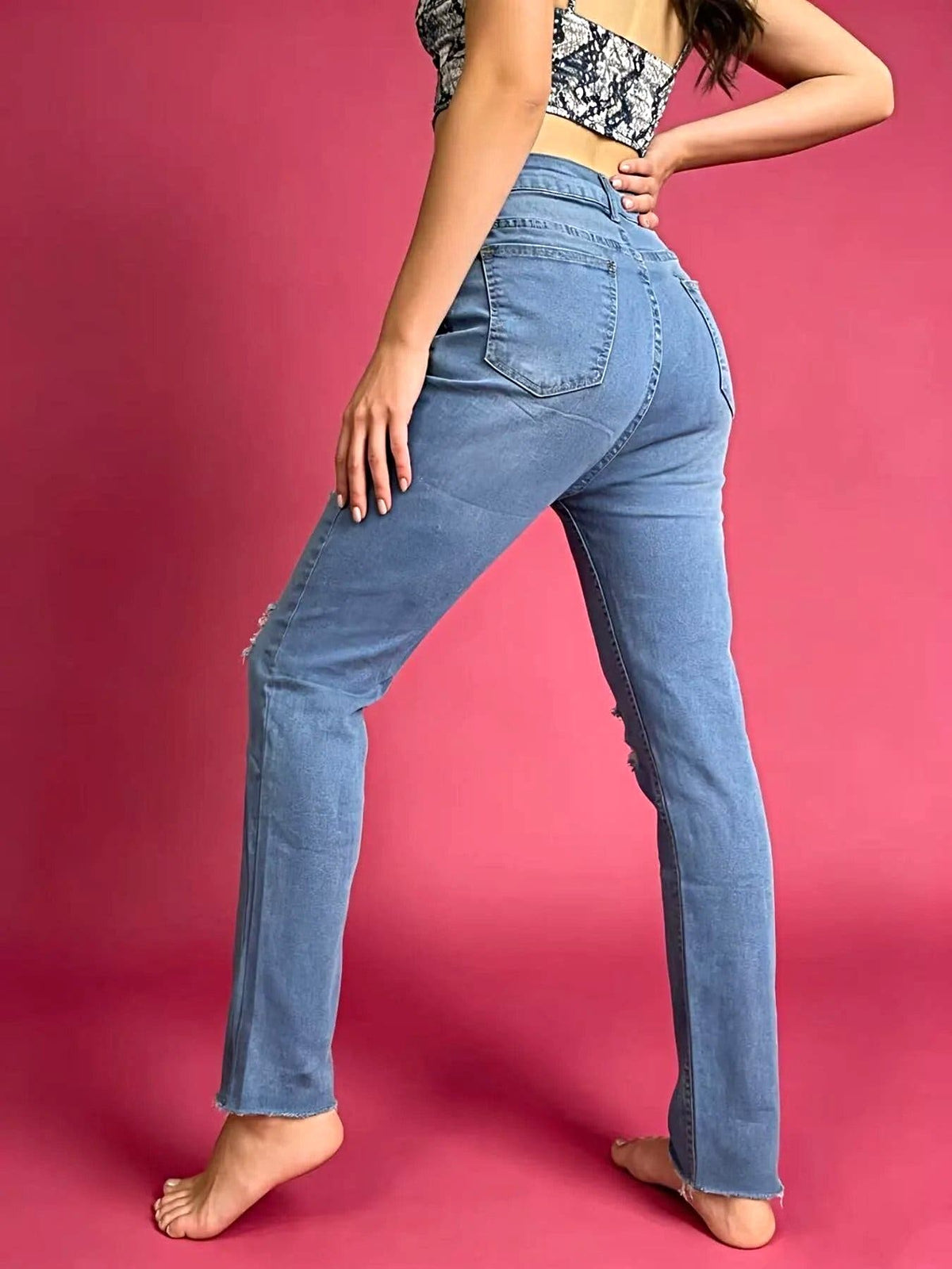 High-Waisted Distressed Jeans -