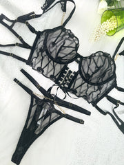 Detail view of the gold-tone chain accents on the Adriana Noir Sexy Lace Lingerie Set, adding a luxurious touch to the ensemble.