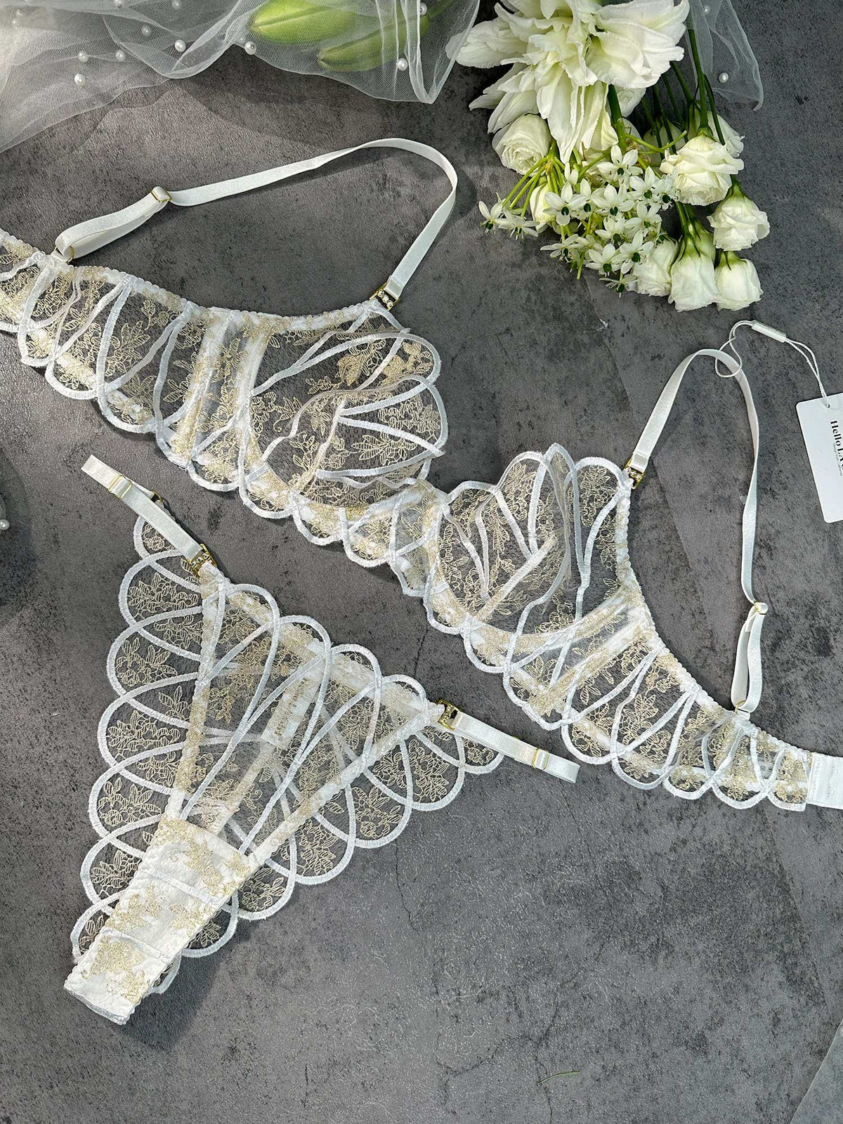 Detailed view of the adjustable straps on the Heavenly Glow Radiance bridal lingerie set, combining functionality with luxury design.