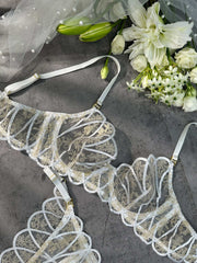 Heavenly Glow Radiance bridal lingerie set in an exquisite arrangement emphasizing its luxurious comfort and elegant design.