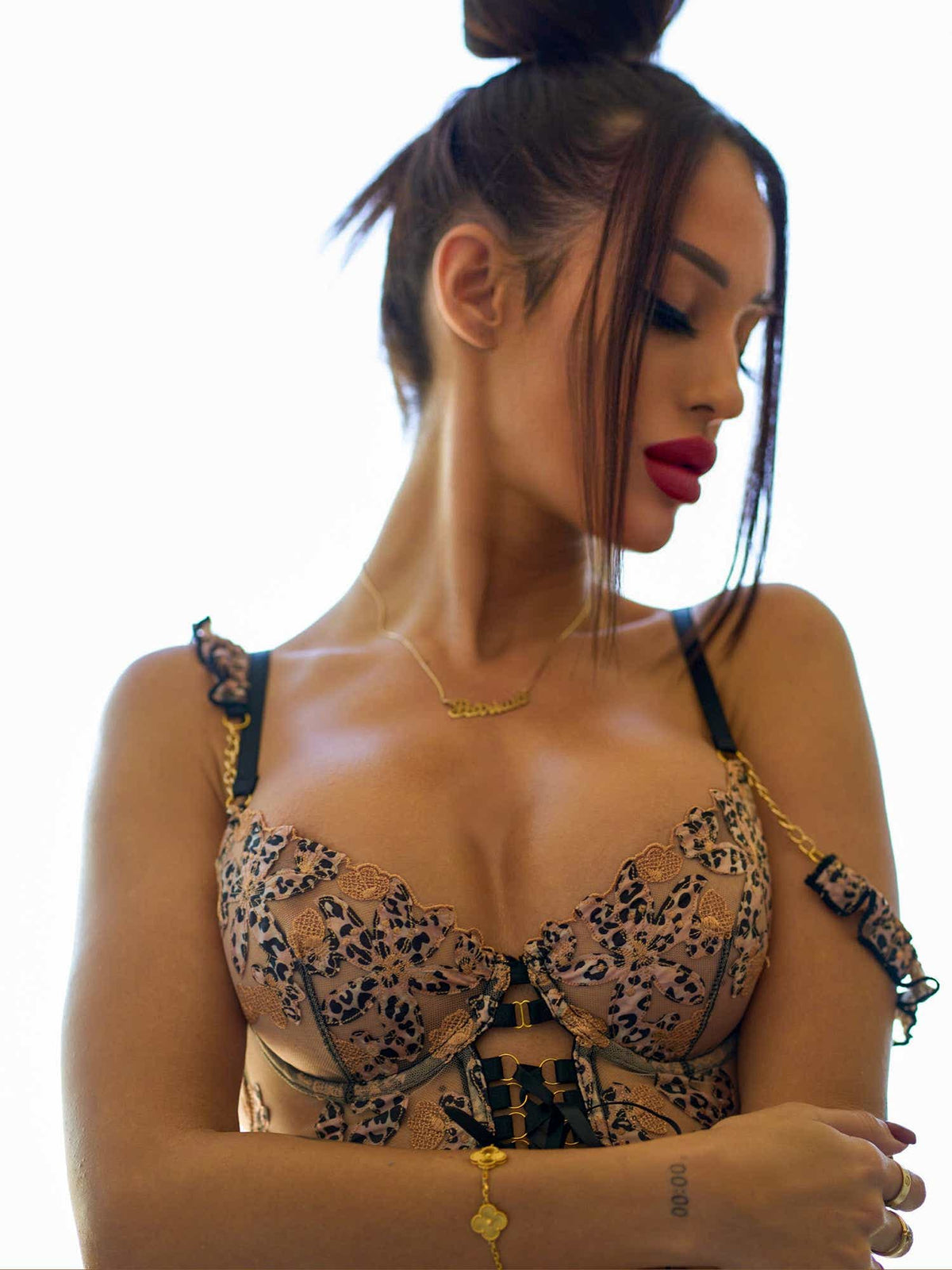 Charming front view of the Seductive Leopard Lace Lingerie Set exhibiting its captivating design.