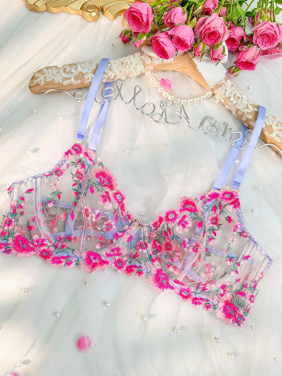 Luxe pink floral lingerie set with whimsical charm and delicate detailing, a must-have for any intimate collection.
