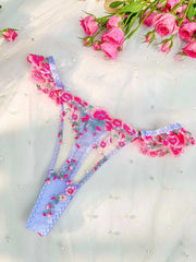 Irresistible pink floral lingerie set adorned with beautiful embroidery, celebrating romance and femininity.