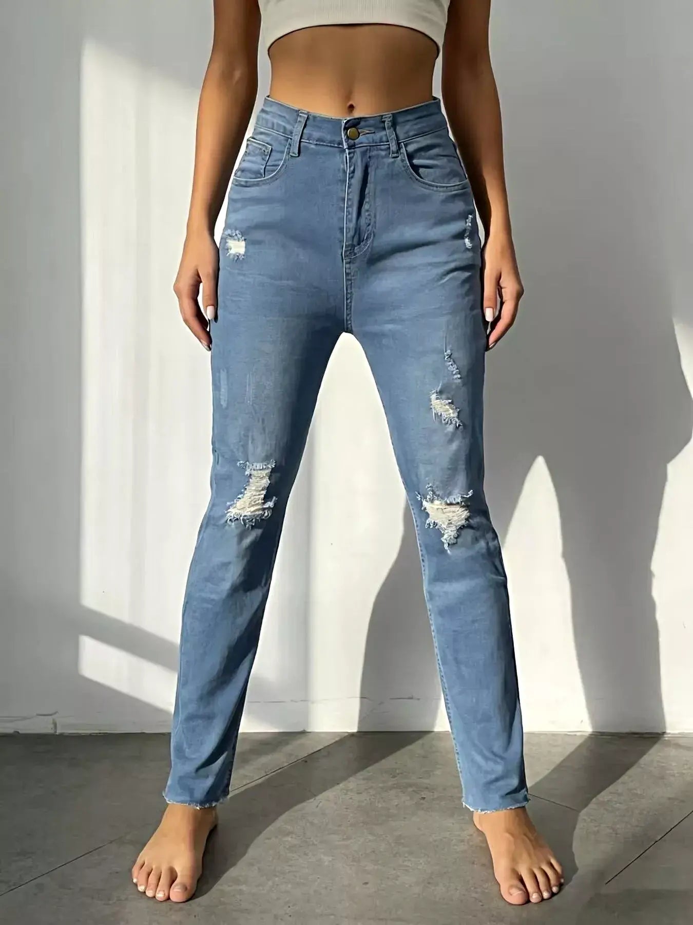High-Waisted Distressed Jeans -