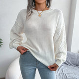Jaukts trikotāžas džemperis ar apaļu kakla izgriezumu uz pleciem Trendsi