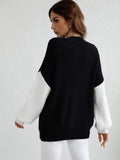 Двоколірний трикотажний светр із запущеними плечима Trendsi